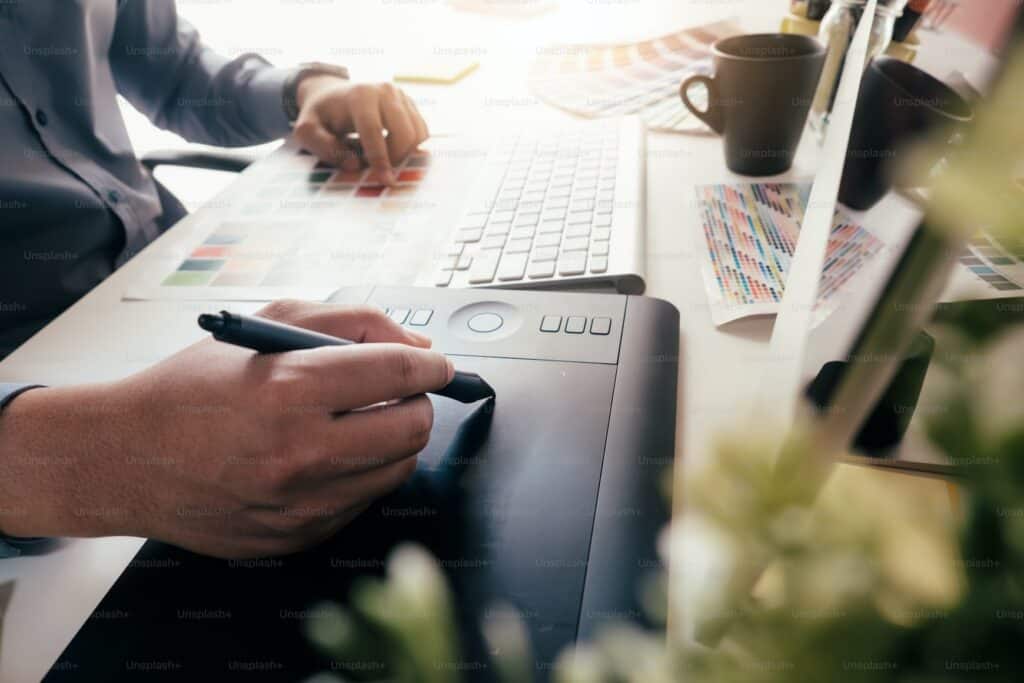 A graphic designer using a sketching pad 